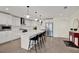 Well-lit kitchen featuring a large island with seating and stainless steel appliances at 920 N Osceola Ave # 301, Clearwater, FL 33755