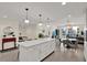 Bright kitchen island with pendant lighting and stainless steel appliances at 920 N Osceola Ave # 301, Clearwater, FL 33755