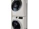 Modern white stacked washer and dryer set with digital display panel at 920 N Osceola Ave # 301, Clearwater, FL 33755