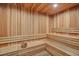 A private sauna room clad in natural wood, featuring multi-tiered benches for relaxation at 920 N Osceola Ave # 301, Clearwater, FL 33755