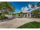 Charming community center with a gated entrance and courtyard with a bike rack at 10035 New Parke Rd, Tampa, FL 33626