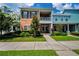 Charming two-story townhome with brick facade, balcony and well manicured lawn at 10035 New Parke Rd, Tampa, FL 33626