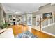 Open-concept home office with wood floors and neutral paint at 10035 New Parke Rd, Tampa, FL 33626