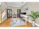 Bright home office with hardwood floors, built-in shelves, and large windows at 10035 New Parke Rd, Tampa, FL 33626