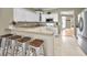 Well-equipped kitchen with granite countertops, breakfast bar, and stainless steel appliances at 10035 New Parke Rd, Tampa, FL 33626