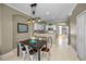 Bright eat-in kitchen features an island with seating and modern appliances, perfect for entertaining at 10035 New Parke Rd, Tampa, FL 33626