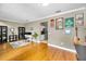 Spacious living room with hardwood floors, ample natural light, and tasteful decor at 10035 New Parke Rd, Tampa, FL 33626