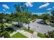 Tranquil neighborhood view showcasing lush landscaping and well-maintained streets on a bright day at 10035 New Parke Rd, Tampa, FL 33626