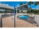 Community splash pool with shower and awning, offering a refreshing retreat for relaxation and fun at 10035 New Parke Rd, Tampa, FL 33626
