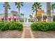 Vibrant town center with various restaurants, palm trees, and fountain, offering an array of dining and recreation at 10035 New Parke Rd, Tampa, FL 33626
