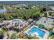 Aerial view of the community's resort-style pools, clubhouse, and recreation areas at 10229 Waterside Oaks Dr, Tampa, FL 33647