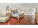 The main bedroom features hardwood floors, ensuite, and light-filled space at 10229 Waterside Oaks Dr, Tampa, FL 33647
