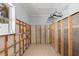 Walk-in closet with exposed framing, ready for customization at 106 13Th Ave, St Pete Beach, FL 33706