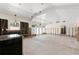 Large kitchen under renovation, showcasing a bright, open space with modern lighting fixtures and potential at 106 13Th Ave, St Pete Beach, FL 33706