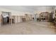 Large open-concept living area under renovation, featuring tile flooring and open design for versatile use at 106 13Th Ave, St Pete Beach, FL 33706