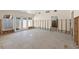 Open-concept living area during renovation, featuring tile flooring, bright natural light, and flexible design options at 106 13Th Ave, St Pete Beach, FL 33706