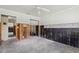 Room with exposed walls and concrete flooring, ready for updates at 106 13Th Ave, St Pete Beach, FL 33706
