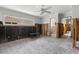 Room with concrete flooring and exposed framing, under construction at 106 13Th Ave, St Pete Beach, FL 33706