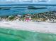 Breathtaking aerial of beachfront home with direct beach access and waterfront views at 1070 Eldorado Ave, Clearwater Beach, FL 33767