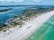 Breathtaking aerial view of a waterfront community highlighting coastline and beaches at 1070 Eldorado Ave, Clearwater Beach, FL 33767