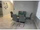 Formal dining room featuring tile flooring and modern decor at 11010 Salt Tree Dr, Port Richey, FL 34668