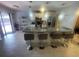 Gourmet kitchen with granite counters and stainless steel appliances at 11010 Salt Tree Dr, Port Richey, FL 34668
