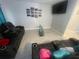 Comfortable living room with ample seating and a modern aesthetic at 11010 Salt Tree Dr, Port Richey, FL 34668