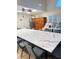 Large activity room with tables and chairs for creative projects at this senior living community at 1142 Sweet Jasmine Dr, Trinity, FL 34655