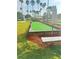 Inviting bocce ball court with seating, ideal for outdoor entertainment and relaxation at 1142 Sweet Jasmine Dr, Trinity, FL 34655