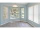 Breakfast nook with tile flooring and large windows that provide a view at 1142 Sweet Jasmine Dr, Trinity, FL 34655