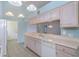 Kitchen featuring stylish cabinets and modern countertops at 1142 Sweet Jasmine Dr, Trinity, FL 34655