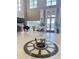Bright lobby featuring elegant decor, a grand piano, and serene views in this senior living community at 1142 Sweet Jasmine Dr, Trinity, FL 34655