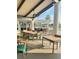 Outdoor patio with seating and lake views at this senior living community at 1142 Sweet Jasmine Dr, Trinity, FL 34655