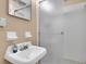 Compact bathroom featuring a shower and a single sink vanity at 13533 Bay Lake Ln, Tampa, FL 33618