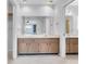 Bathroom featuring double vanities with ample counter space at 13533 Bay Lake Ln, Tampa, FL 33618