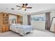 Bedroom featuring a storage unit and natural light at 13533 Bay Lake Ln, Tampa, FL 33618