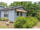 Charming home with lush greenery creating a private and serene setting at 13533 Bay Lake Ln, Tampa, FL 33618