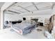 Car garage with three classic cars being repaired in a large space at 13533 Bay Lake Ln, Tampa, FL 33618