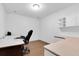 Bright office space featuring a desk, cabinets, and neutral walls and flooring at 13533 Bay Lake Ln, Tampa, FL 33618