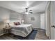 Comfortable bedroom with ceiling fan, plush bedding, and stylish decor for a relaxing retreat at 1400 Gandy N Blvd # 1504, St Petersburg, FL 33702