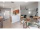 Open concept dining area next to the kitchen with seating for four at 14614 Rannoch Moor Pl, Wimauma, FL 33598