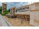 Stone community sign with lush landscaping and a water feature welcomes you to Ayersworth at 14614 Rannoch Moor Pl, Wimauma, FL 33598
