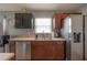 Spacious kitchen with stainless steel appliances and ample counter space at 14614 Rannoch Moor Pl, Wimauma, FL 33598