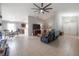 Spacious living room with tile floors, neutral paint, and an open concept design at 14614 Rannoch Moor Pl, Wimauma, FL 33598