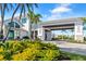 Gated community entrance with lush landscaping and modern architectural design at 15817 San Lazzaro Ave, Bradenton, FL 34211