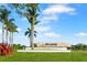 Community entrance to Esplanade at Azario Lakewood Ranch with beautiful landscaping and signage at 15817 San Lazzaro Ave, Bradenton, FL 34211