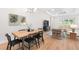 This dining area features a modern chandelier and table with seating for six at 15817 San Lazzaro Ave, Bradenton, FL 34211