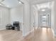This foyer features a recessed ceiling, tile flooring, and a glass paneled front door at 15817 San Lazzaro Ave, Bradenton, FL 34211