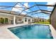 Beautiful in-ground pool with patio and cage, perfect for a cool swim and enjoying views of the property at 15817 San Lazzaro Ave, Bradenton, FL 34211