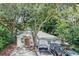Cozy single-story home with mature trees and a long driveway; ample parking available at 1608 E Linden Ave, Tampa, FL 33604